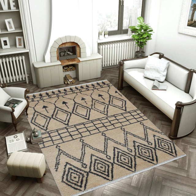 Elevate your space with the timeless artistry of a handmade Moroccan rug, meticulously crafted by skilled artisans using...