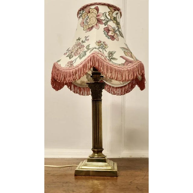 Corinthian Column Brass Table Lamp with Scalloped Linen Shade A very pretty piece, the base of the lamp is made in brass...
