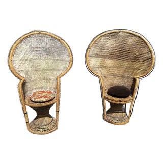 This Pair of Vintage 1970s Boho Wicker and Rattan Peacock Chairs Features High, Dramatic Fan Backs and Hourglass Pedestal Bases. For Sale