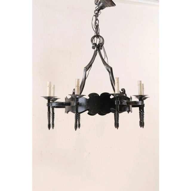 French Mid-20th Century Iron Ring Chandelier With Eight Torch-Shaped Lights For Sale - Image 4 of 10
