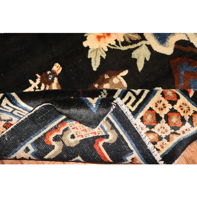 Full plush pile Chinese Batou Animal Pictorial design rug from the 2nd quarter of the 20th century Measure: 4'4'' x 6'9''.