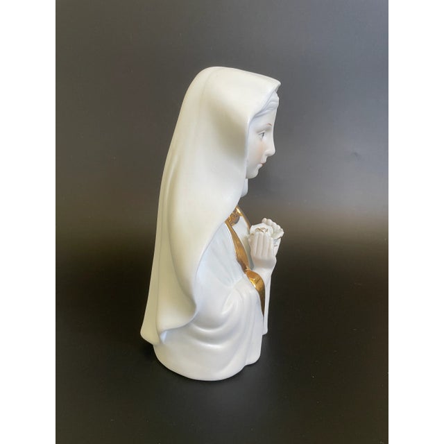 Vintage Bisque Porcelain Virgin Mary Holding A Rose Bust. White unglazed body with gold glazed accents. Very nice...