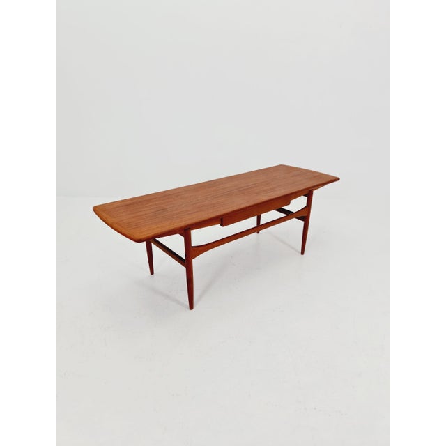 Danish teak coffee table with drawer by Arrebo Møbelfabrik, 1960s. Design year: 1960s. Made in Denmark by Arrebo...