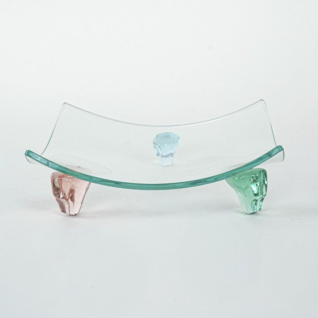 The platter was made in the 1970s in Italy. A glass platter from the 1970s, with a minimalist form and geometric...