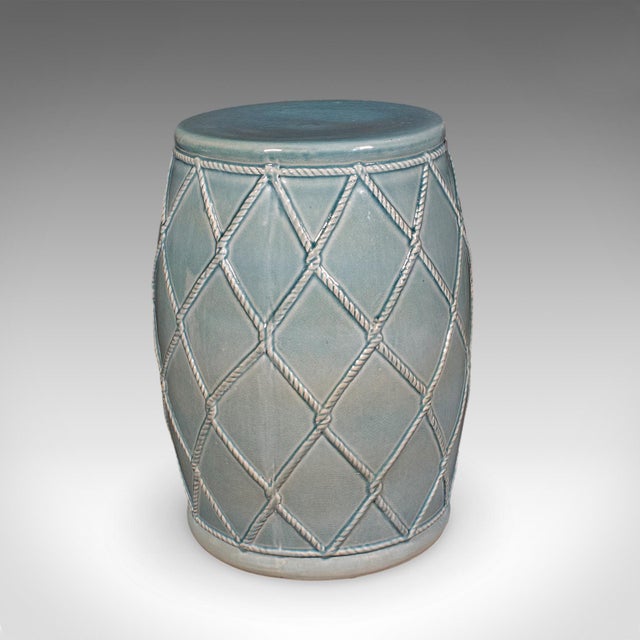 This is a vintage planter base. A Chinese, ceramic jardiniere stand or garden seat with maritime rope motif, dating to the...