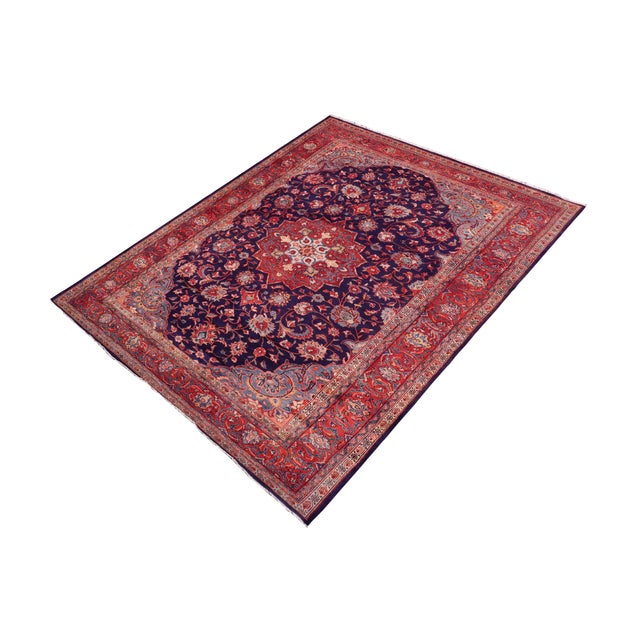 This rug showcases fine craftsmanship with detailed floral Medallion pattern work and a dense wool pile, offering both...