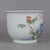 This elegant porcelain planter features a classic silhouette with a flared rim, resting upon a slightly tapered foot. The...