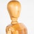 A mid-century life size artist's articulated mannequin or model, made of solid wood. A metal rod attaches to the back of...