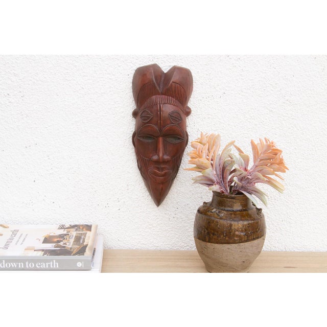 This charming Kwele mask from Gabon or the Republic of Congo is a delightful example of African tribal art. The mask is...