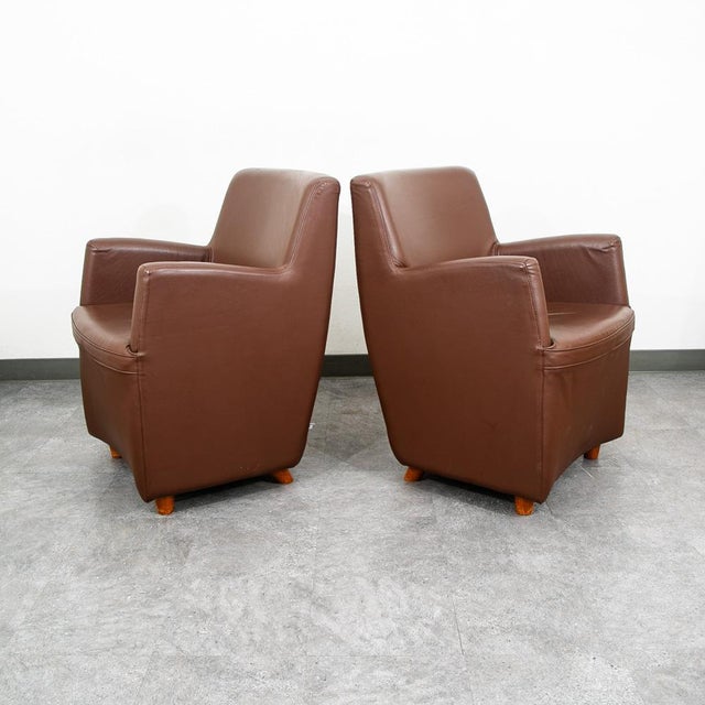 High quality chocolate brown leather lounge chair set by N. Eilersen. Extremely comfortable and unique set. This piece is...