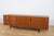 This magnificent mid-century Danish design sideboard credenza was designed by Ib Kofod-Larsen and manufactured by G-Plan...