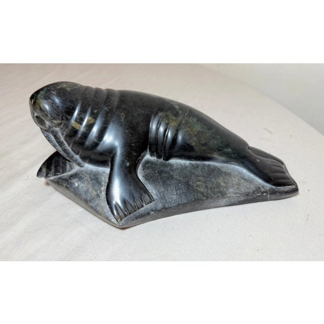 Up for sale is a high quality hand carved vintagee Canadian Inuit soapstone Eskimo sculpture signed underneath and is disc...