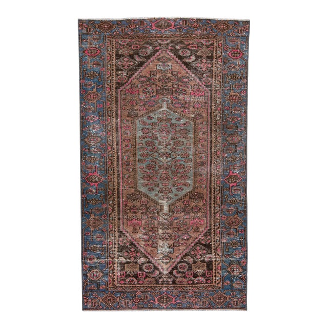 1960s Vintage Persian Distressed Handmade Tribal Pink Wool Rug For Sale