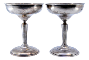 Silver Champagne Glasses with Engraved Floral Motifs