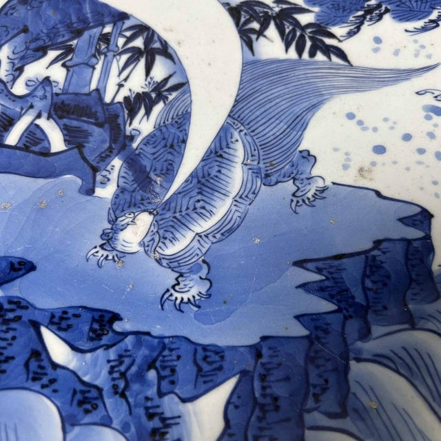 Large Arita Porcelain Plate with the Image of a Minogame and Cranes from the Late Edo Period (mid-19th century). An...