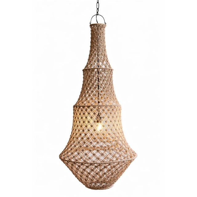 Impressive hand knotted macrame pendant light in a soft taupe color. Wonderful in groupings of different sizes or on its...