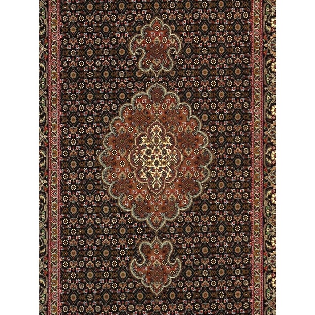 Tabriz Design rugs are distinguished by their excellent weave and by their remarkable adherence to the classical...
