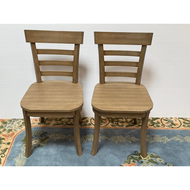 Design Plus Gallery presents a Pair of Liam Dining Chair from Pottery Barn. Crafted from rubberwood, a sustainably...
