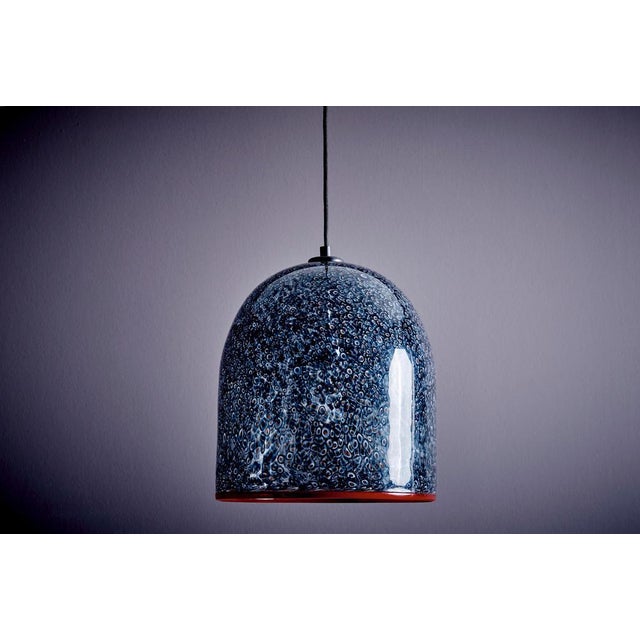 Neverino Murano Glass Pendant Lamp by Gae Aulenti for Vistosi, suspended from a black cord with ceiling cap. The hand-...