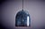 Neverino Murano Glass Pendant Lamp by Gae Aulenti for Vistosi, suspended from a black cord with ceiling cap. The hand-...