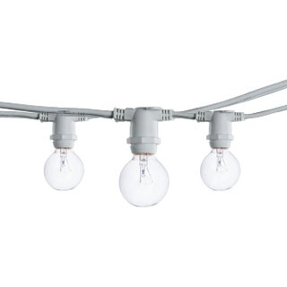 25' Decorative Outdoor String Lights with Clear Incandescent 10 Watt Bulbs in White For Sale