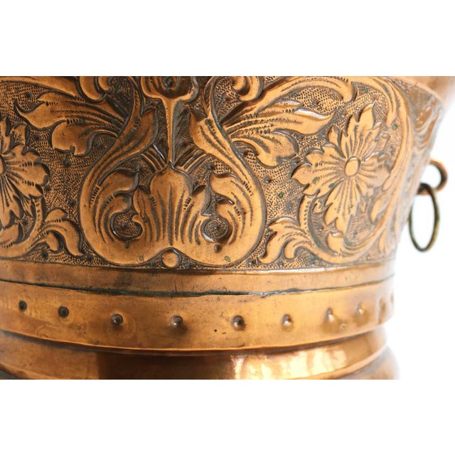 Beautiful and richly decorated Dutch antique copper pot with lid from the 18th century, dated Anno 1750. This exceptional...
