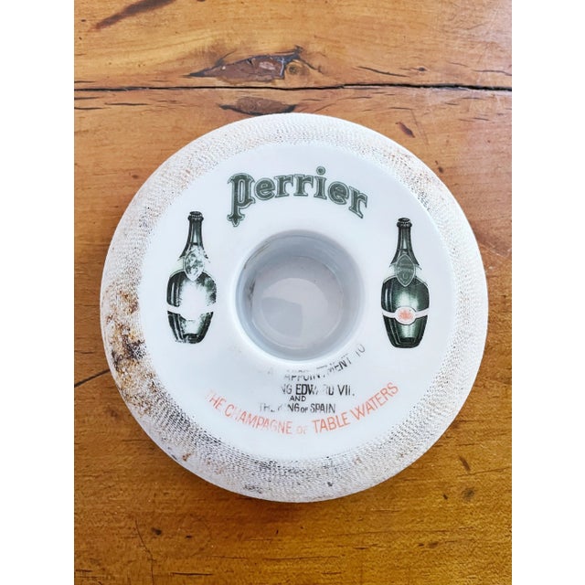 An antique stoneware match striker, made to be used in a bar or restaurant to advertise Perrier water. In excellent...