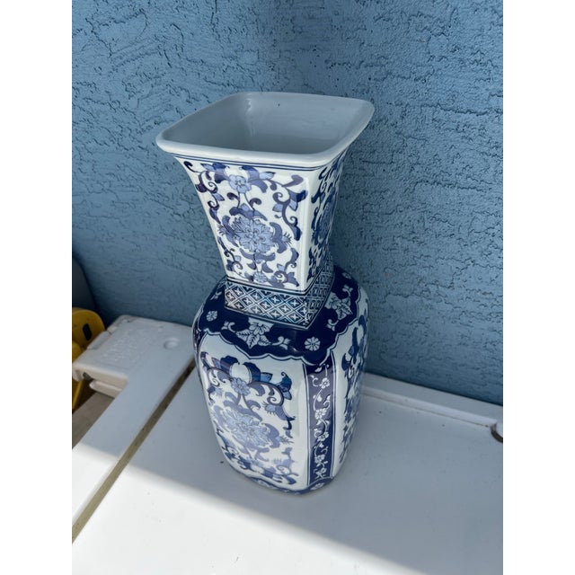 Large Vase featuring a traditional blue and white floral chinoiserie motif. Has original Pier 1 mark on the bottom....