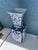 Large Vase featuring a traditional blue and white floral chinoiserie motif. Has original Pier 1 mark on the bottom....