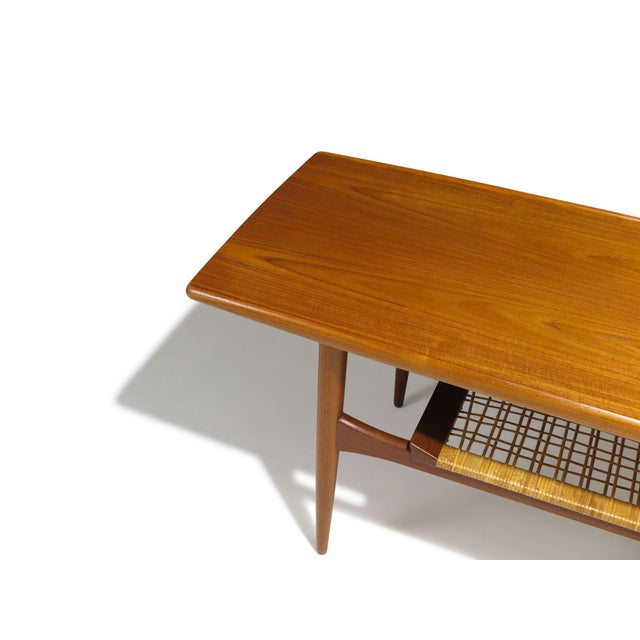 Mid-Century Modern Mid-Century Danish Teak Two-Tier Coffee Table With Sculpted Edges and Caned Shelf For Sale - Image 3 of 11