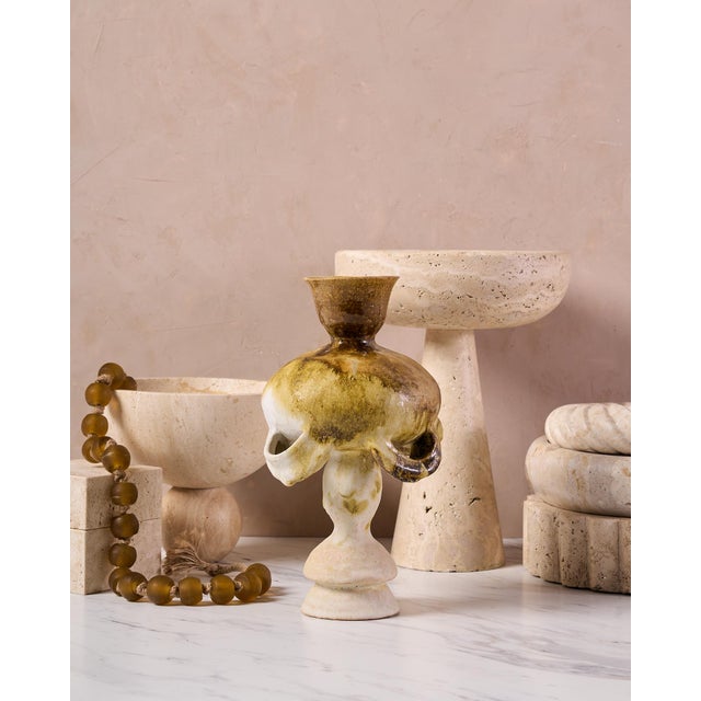 Gorgeous stoneware vase with a white and coffee glaze, this unique design is a perfect vessel for an off-beat overflowing...