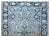 A mesmerizing early 20th century Persian Sarouk Farahan rug with a large central floral medallion living amidst a field of...