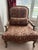 A handsome pair of vintage Homestead House upholstered armchairs combining French Provincial styling with generously...