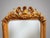 An absolutely stunning French style panel mirror featuring a rich gilt wood and plaster frame with beveled glass. The top...