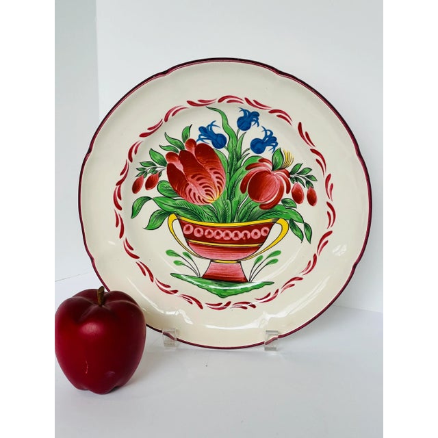 Beaitully painted scalloped 9.5 inch lunch plate with magnificent colors. Cheerful and happy. This can be used as a plate...