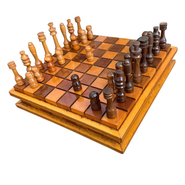 A wonderfully handcrafted vintage wooden chess set showcasing exceptional folk craftsmanship and timeless design. This...