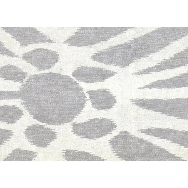 Contemporary Egyptian Kilim in Ikat Design. Hand woven in an Ikat design with wool on cotton foundation in the Fustat...