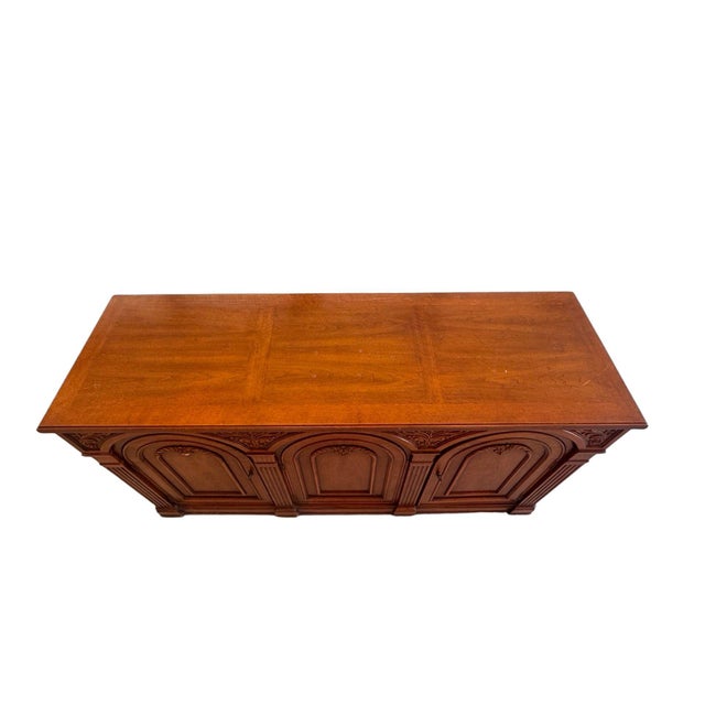 An elegant 1960s French Louis XVI style buffet credenza, embodying the refined symmetry and neoclassical influence...