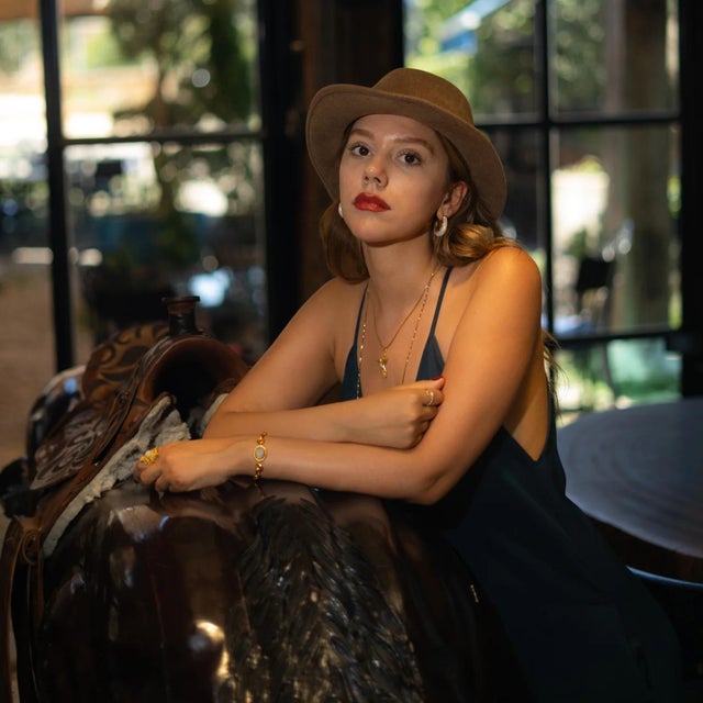 Elevate your everyday look with the Luminous Wave Resin & Gold Hoop Earrings. These unique hoops feature a flowing, wave-...