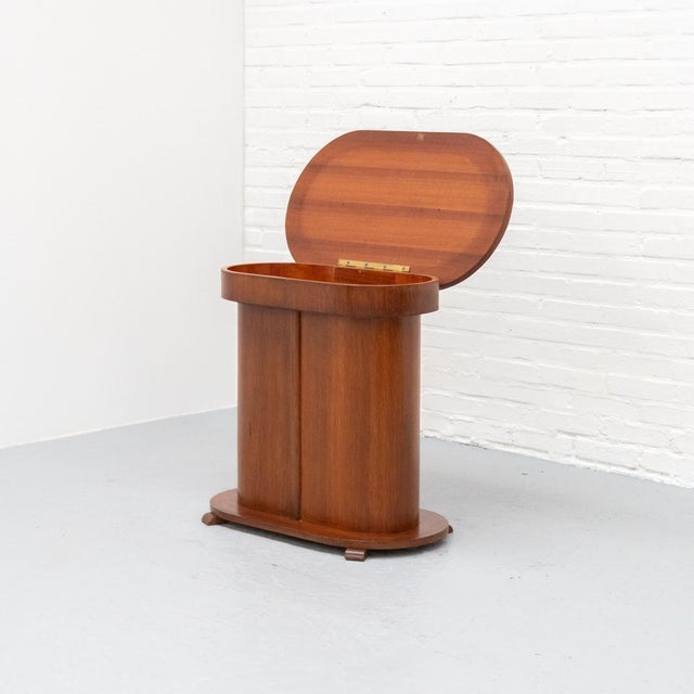 This oval side or occasional table is designed in the Art Deco / Amsterdam School style and dates from the early twentieth...