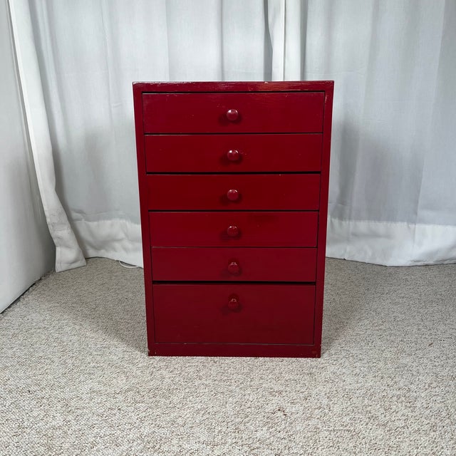 Small red lacquered pine workshop cabinet, 1980 Can be used in several ways: chest of drawers, bedside table, side table,...