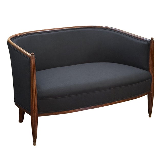 A beautiful French sofa or settee in the Art Deco style, created in the manner of iconic designer Paul Follot, featuring a...