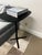 Authentic Davis Furniture Lift adjustable-height table in black. A sleek, contemporary designer piece featuring a rounded...