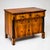 Three-drawer Franconian Biedermeier chest of drawers on plinthed square feet with ebonized full columns supporting the...