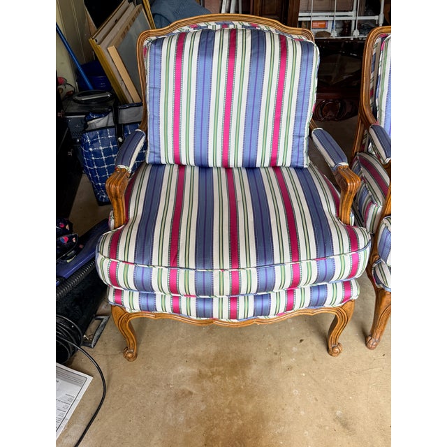 Pair Striped Baker Bergères A preppy stripe on a generous wood framed arm chair from Baker. 29.5” x 24” d x 34” h 18.5”...