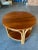 Rare pair of half-round rattan coffee tables, the Pair both feature a half circle design with a rattan base and solid...