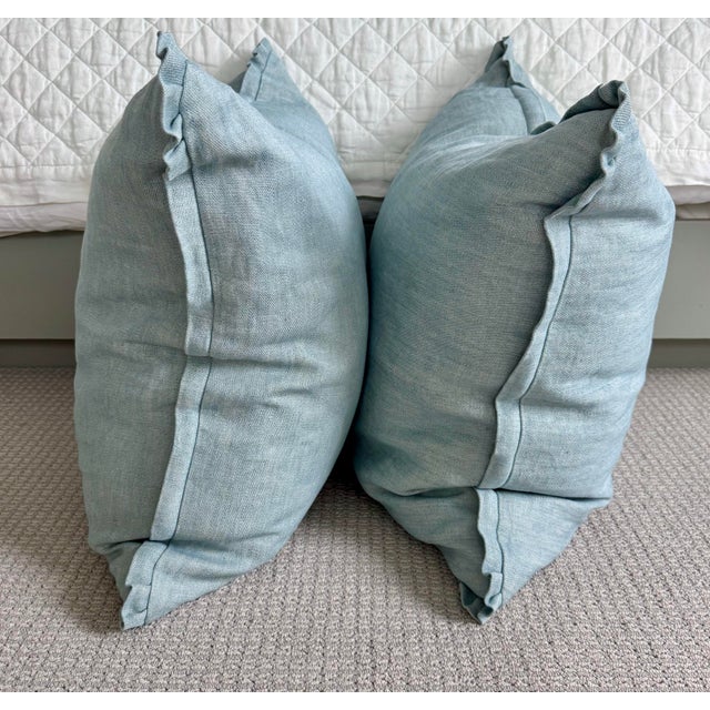 These pillows are so soft and lovely. The blue color has a little bit of green in it but it’s very subtle. The weave is...
