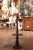 This handsome antique floor lamp combines sculptural Louis XIII styling with the practical addition of an integrated side...