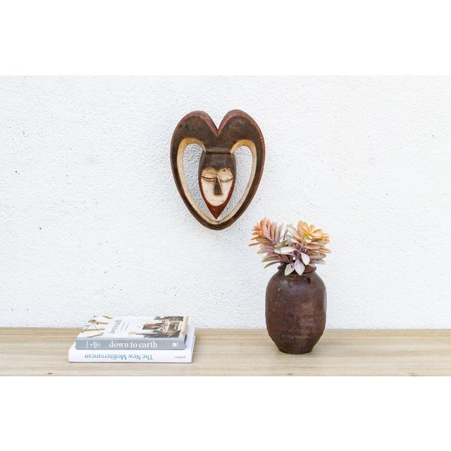 This charming Kwele mask from Gabon or the Republic of Congo is a delightful example of African tribal art. The mask is...