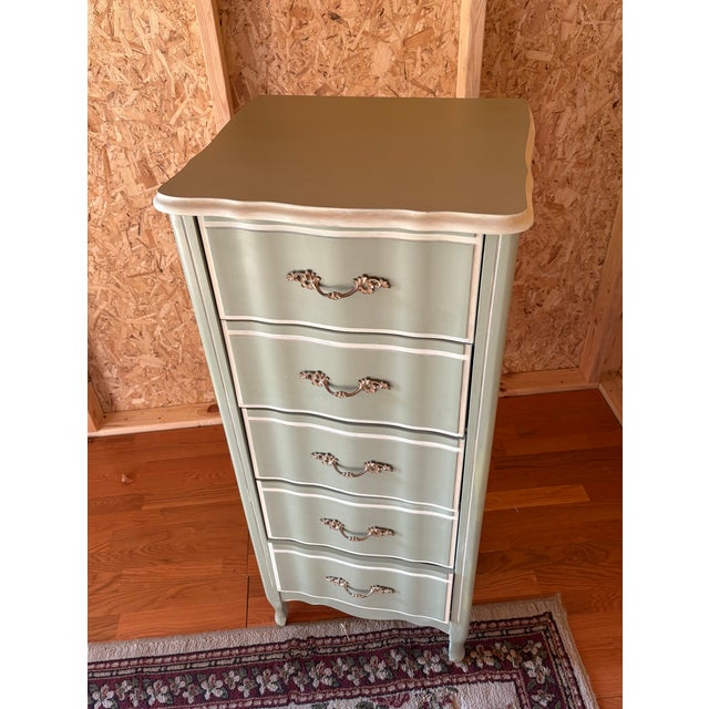 1980s French Provincial style lingerie chest that has been given an elegant update with a sage green furniture paint and...
